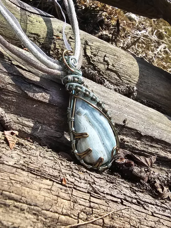 Image d'illustration du produit Pendentif agate rubannée