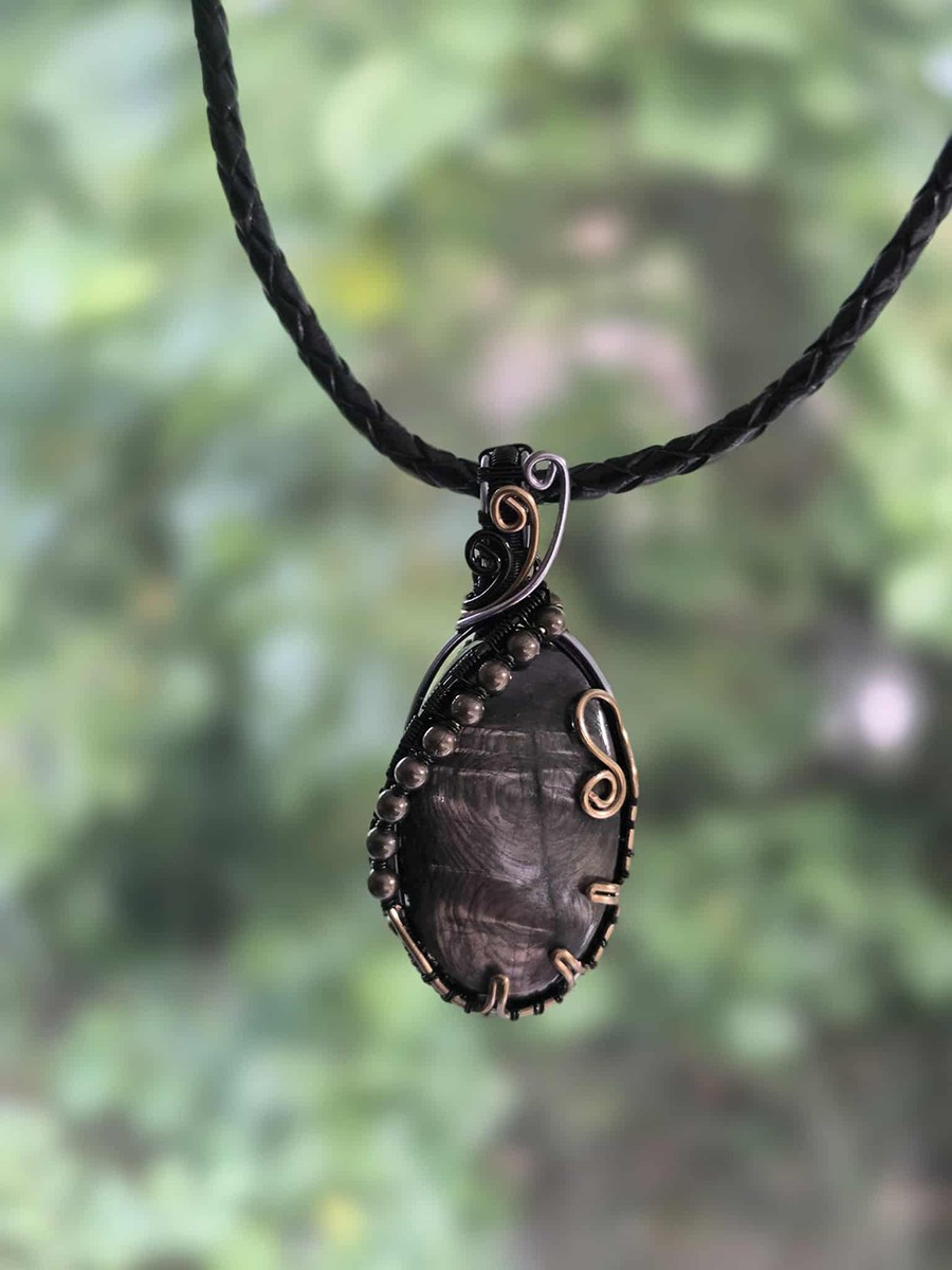 Image d'illustration du produit Pendentif réversible charoïte et hypersthène