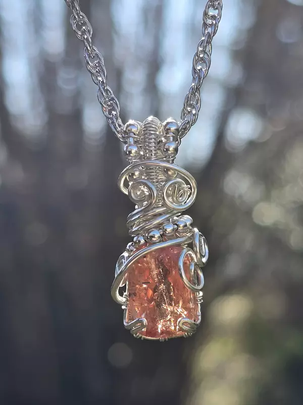 Image d'illustration du produit Pendentif en argent et topaze orangée