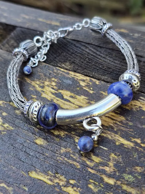 Image d'illustration du produit Bracelet tressé "gunmetal" et lapis lazuli