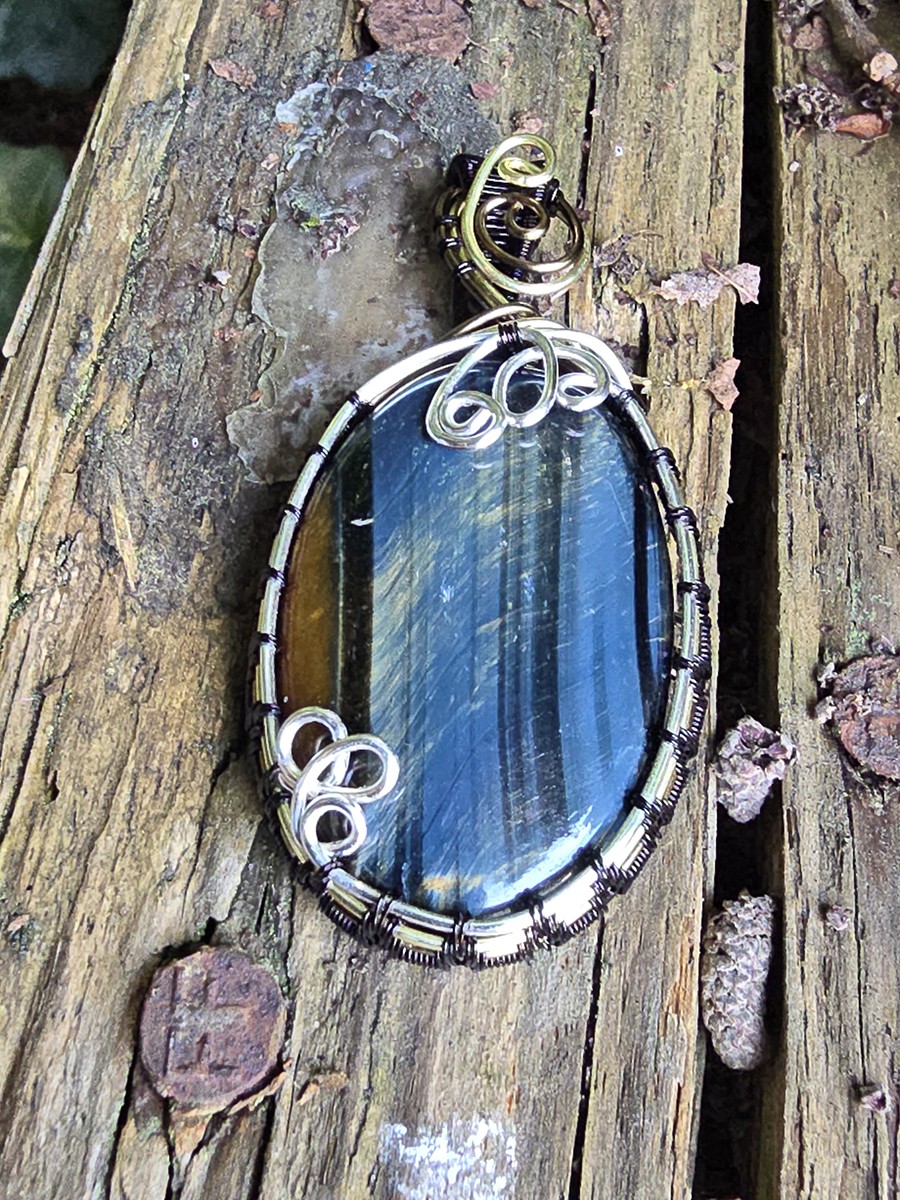 Image de couverture du produit Pendentif Oeil-de-Faucon